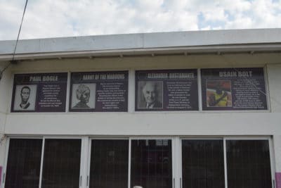 The portraits of the national heroes of Jamaica posted at the front of the school.